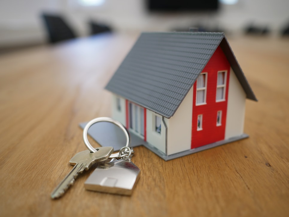 A small house and a key.